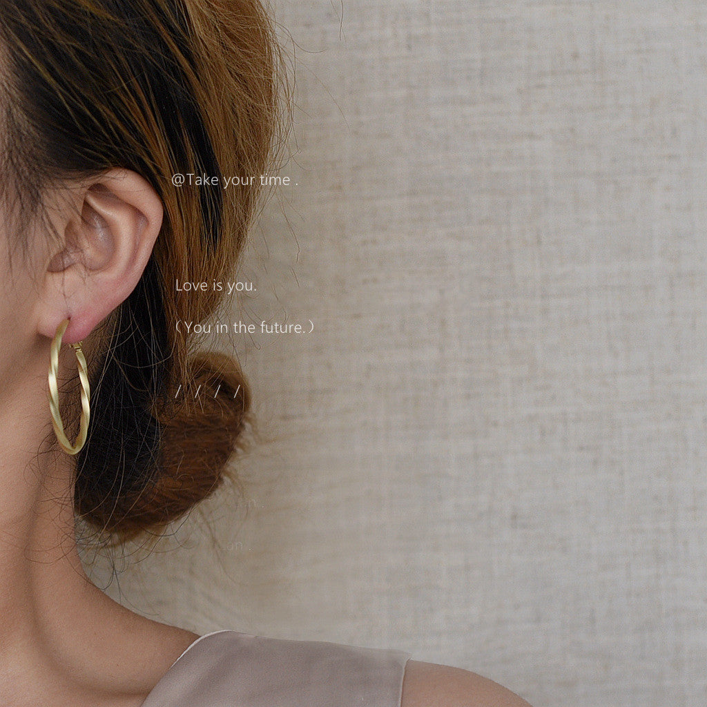 Folded gold earrings